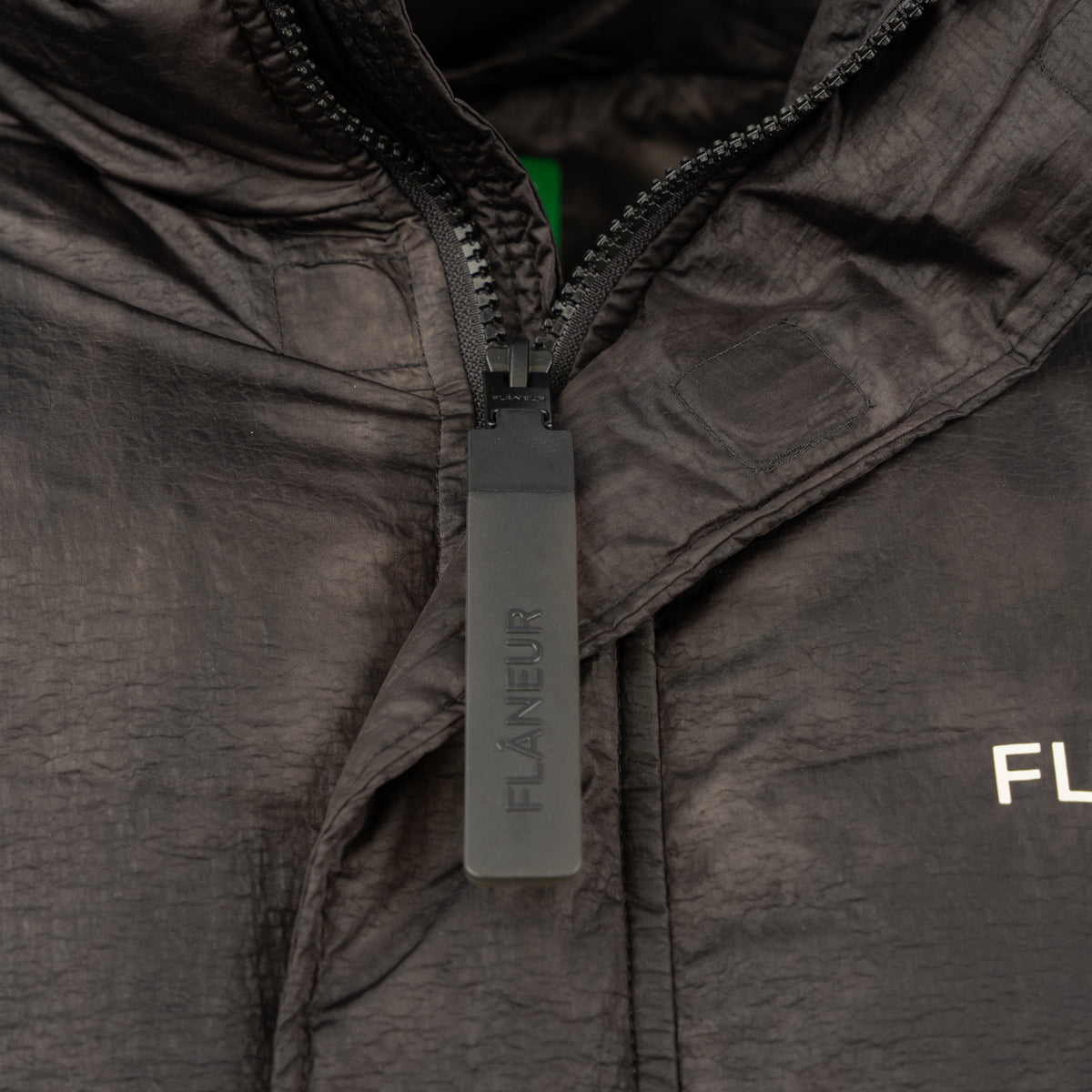 Flaneur Puffer Jack Zwart | Logo Puffer