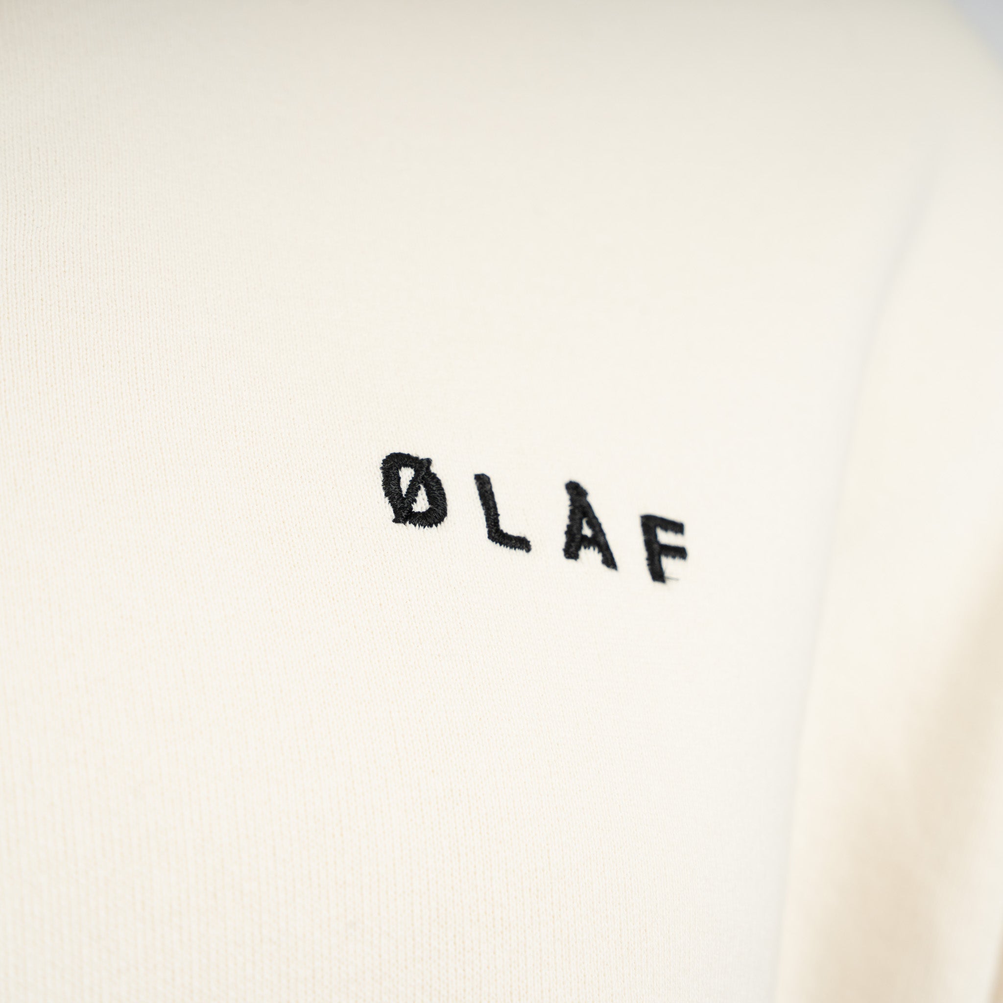 Olaf Polosweater Crème | Script Friends