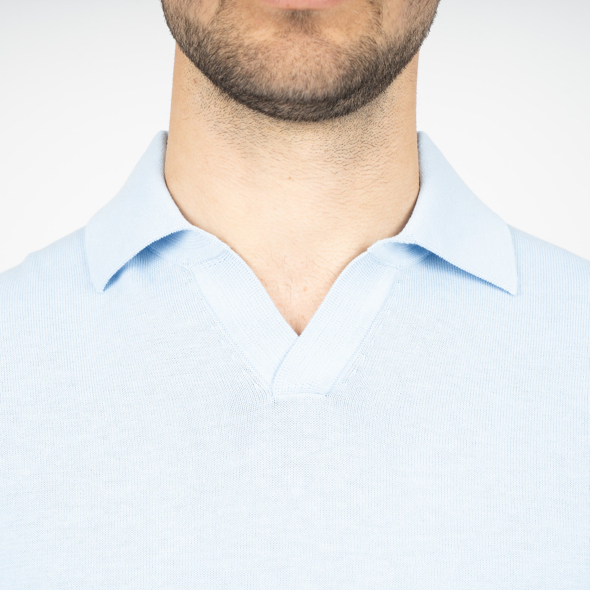 SEVEN DIALS Gebreide Buttonless Polo Lichtblauw | Dyche