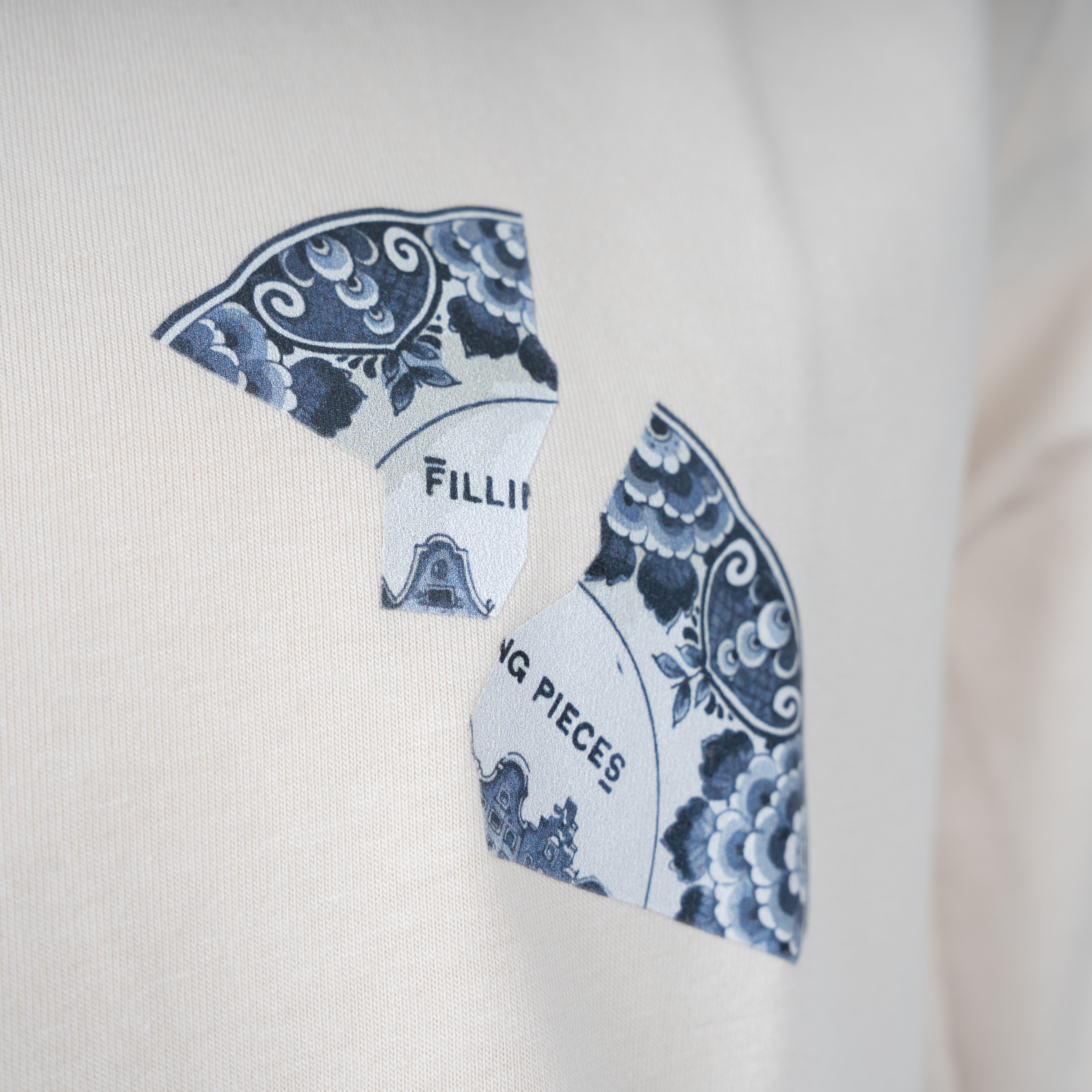 Filling Pieces T-Shirt Backprint Crème | Broken Plate
